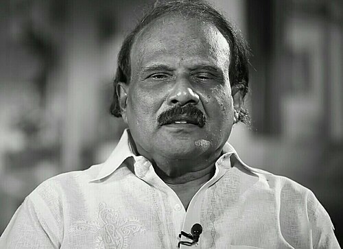 Kaloor Dennis portrait